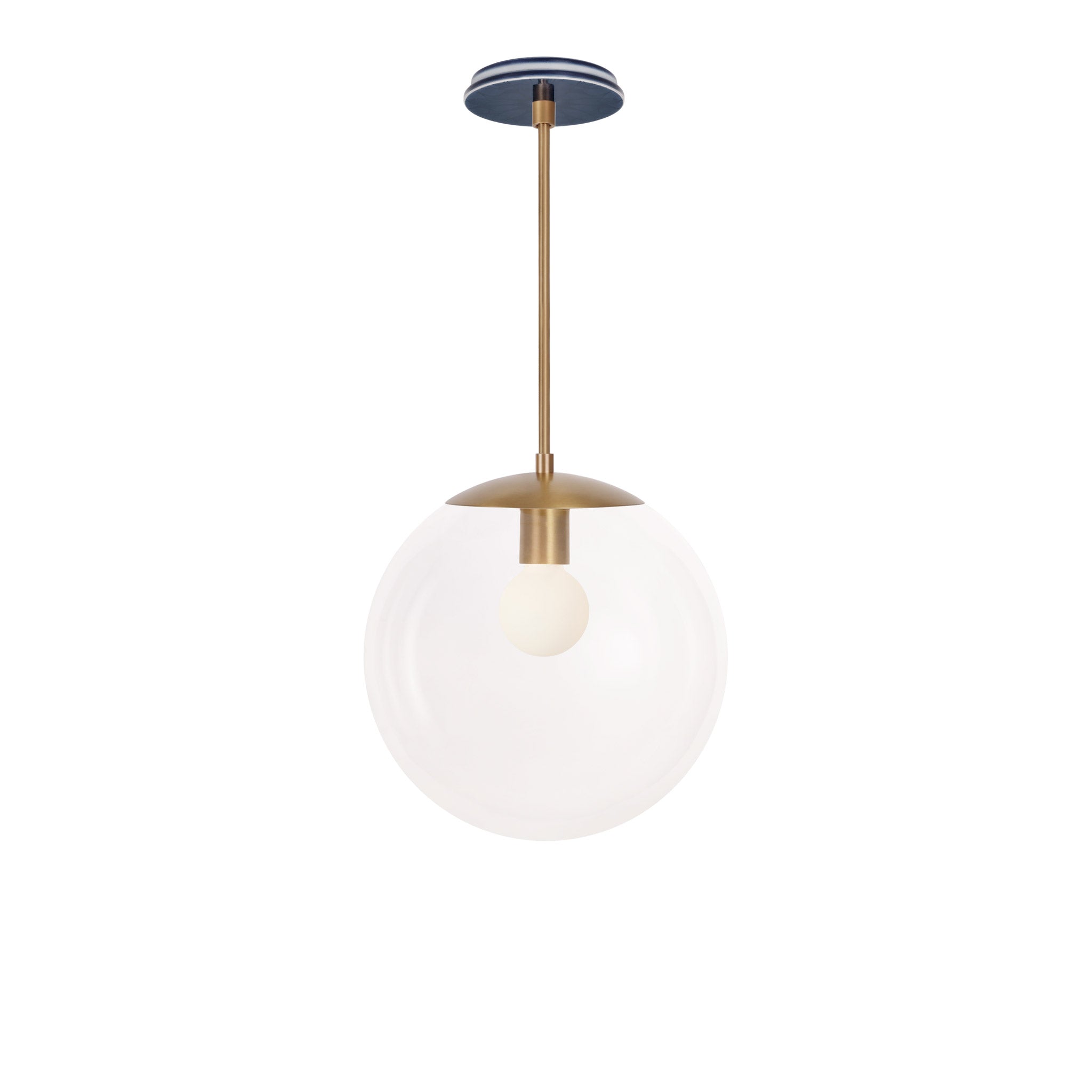 Alto Rod 12” Clear shown in Heirloom Brass with an Indigo Blue Star Ceramic Canopy