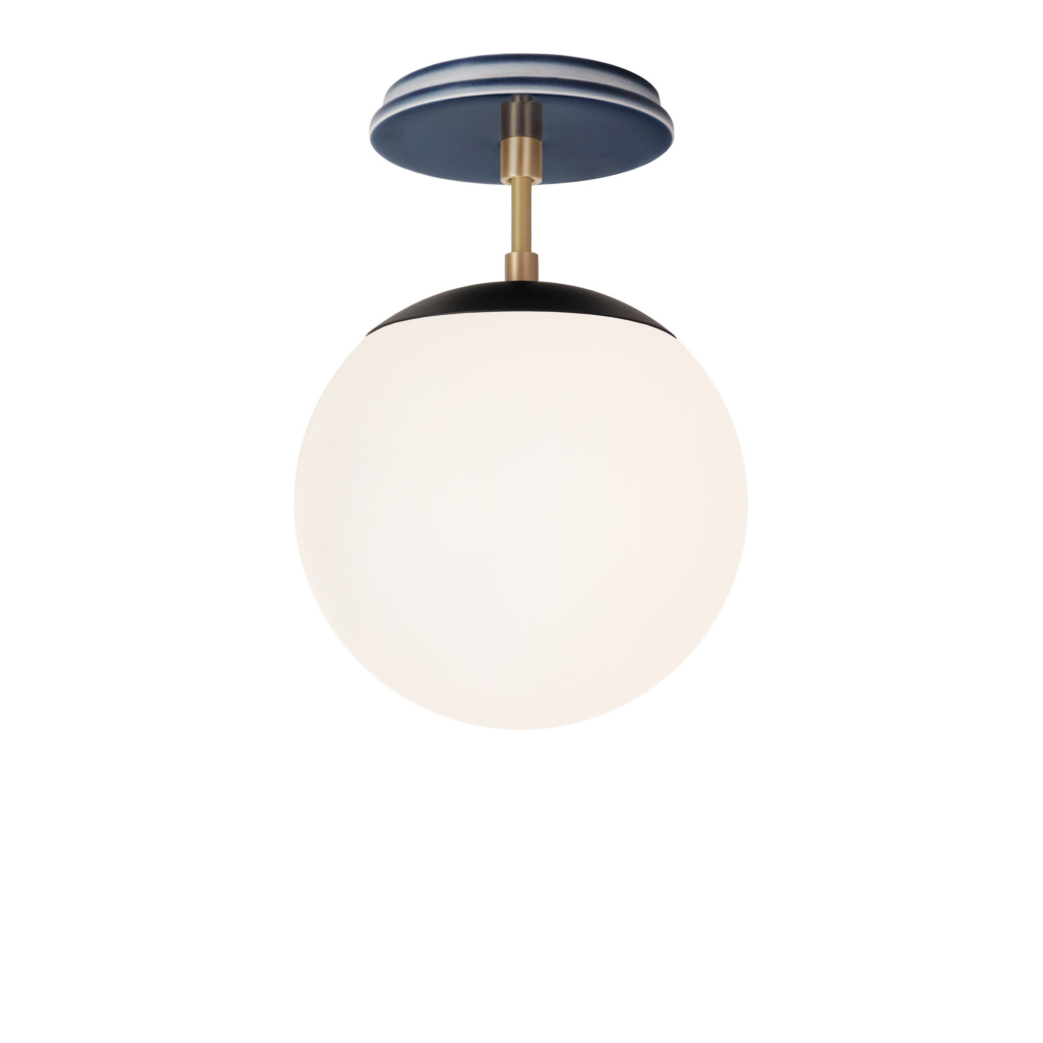Alto Surface 8" shown in Matte Black with Brass and an Indigo Blue Swift Ceramic Canopy