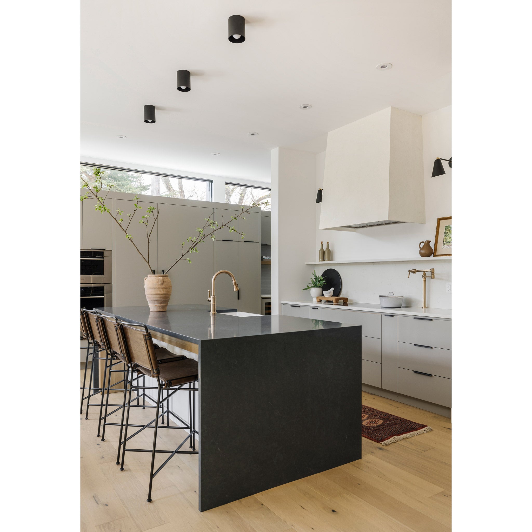 Cape Longs and Tilt Cone Sconces in Matte Black, Interior Design by Alykhan Velji Designs