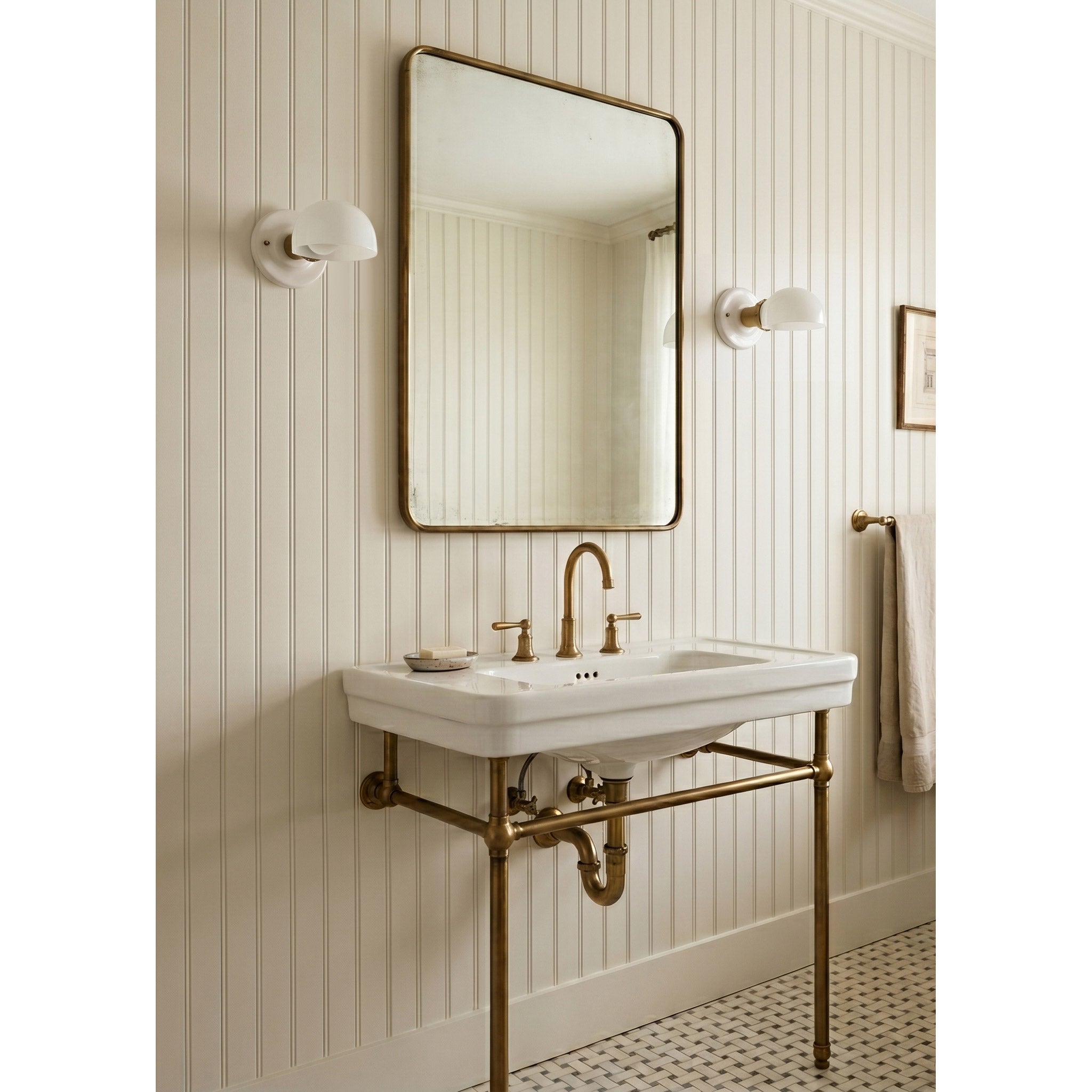 Archie Single Sconces shown in Heirloom Brass Gloss White Ceramic Canopies