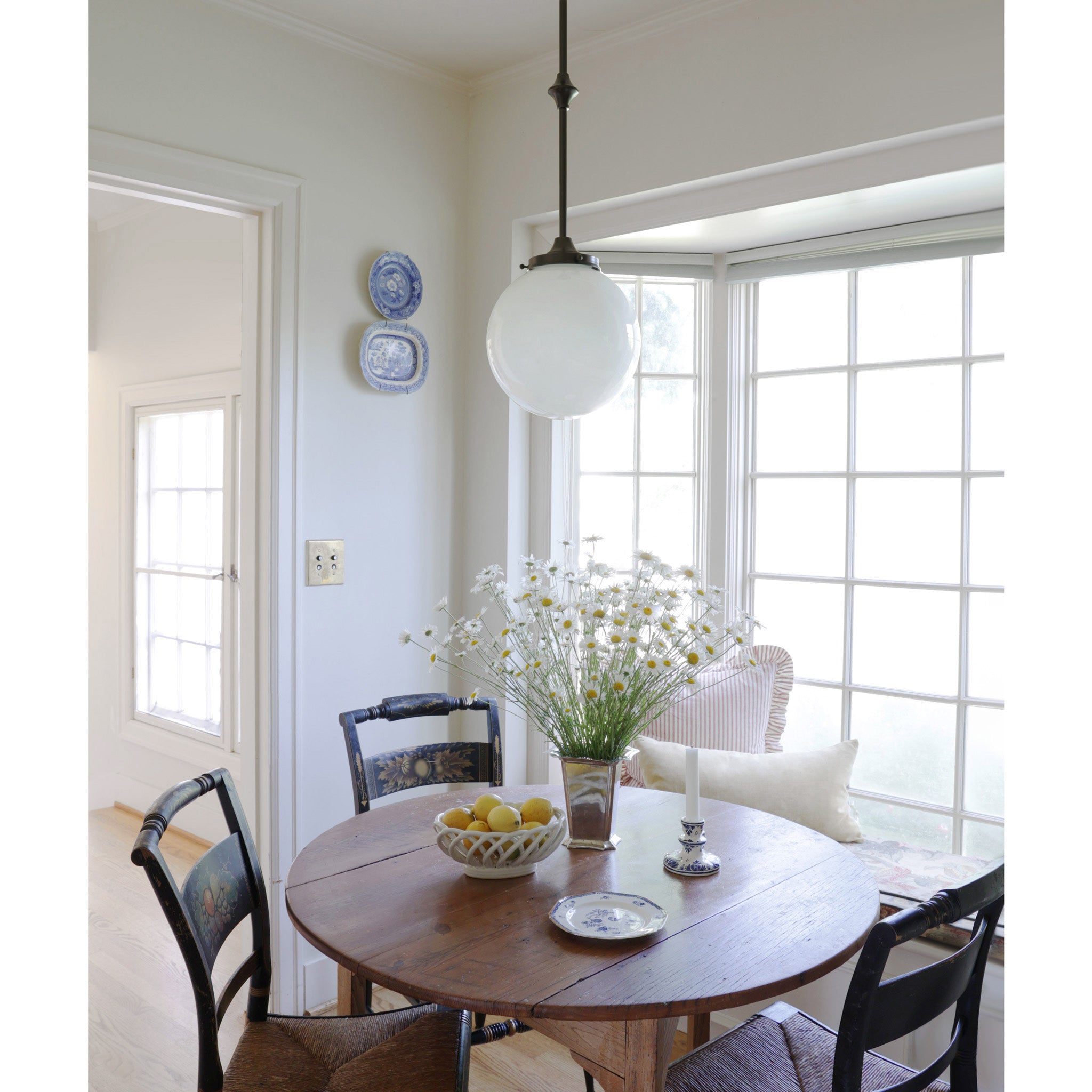 Bijou Pendant 10" Globe shown in Graphite Patina. Interior design by Sarah J. Meyer Design