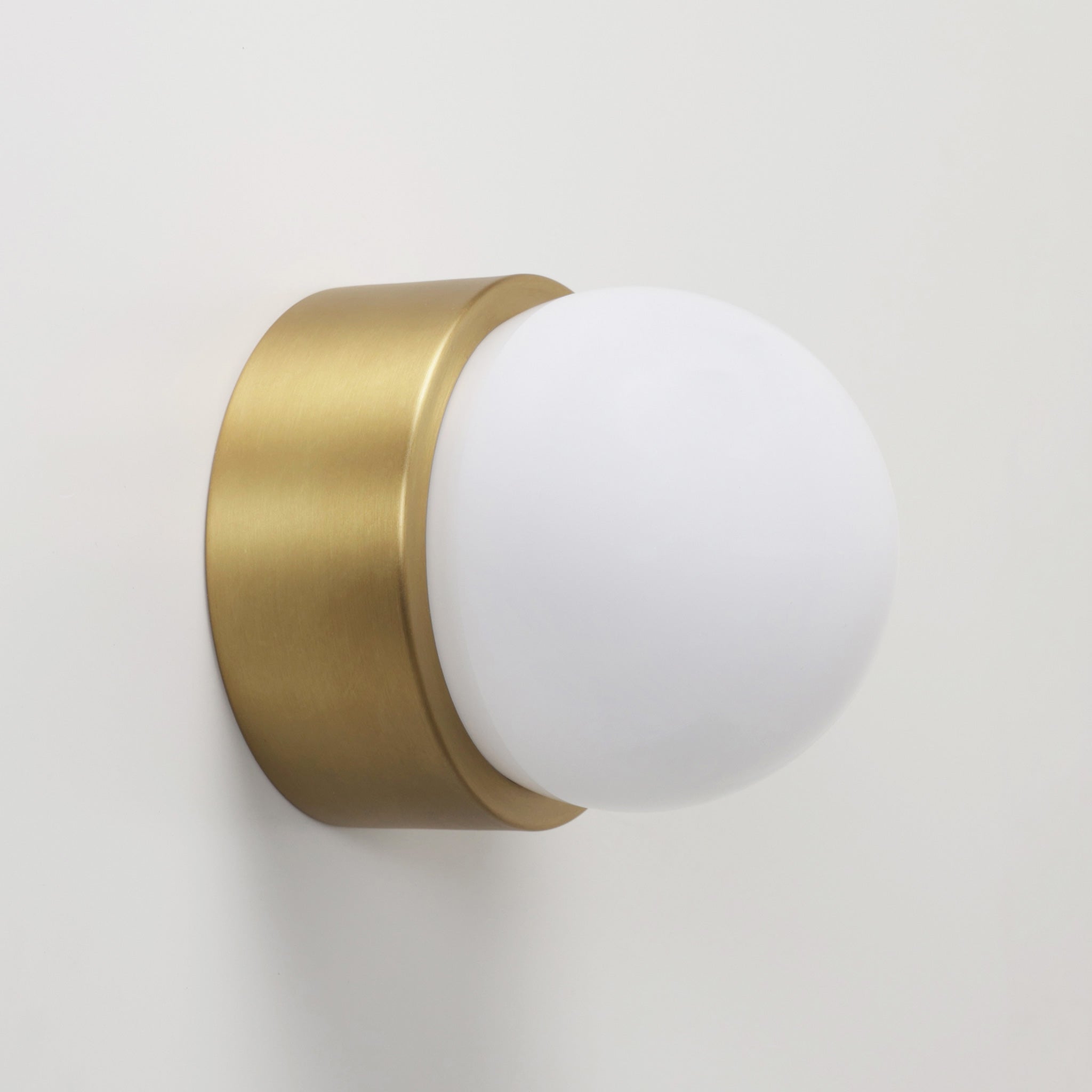 Brass Cutie Sconce shown in Heirloom Brass detail