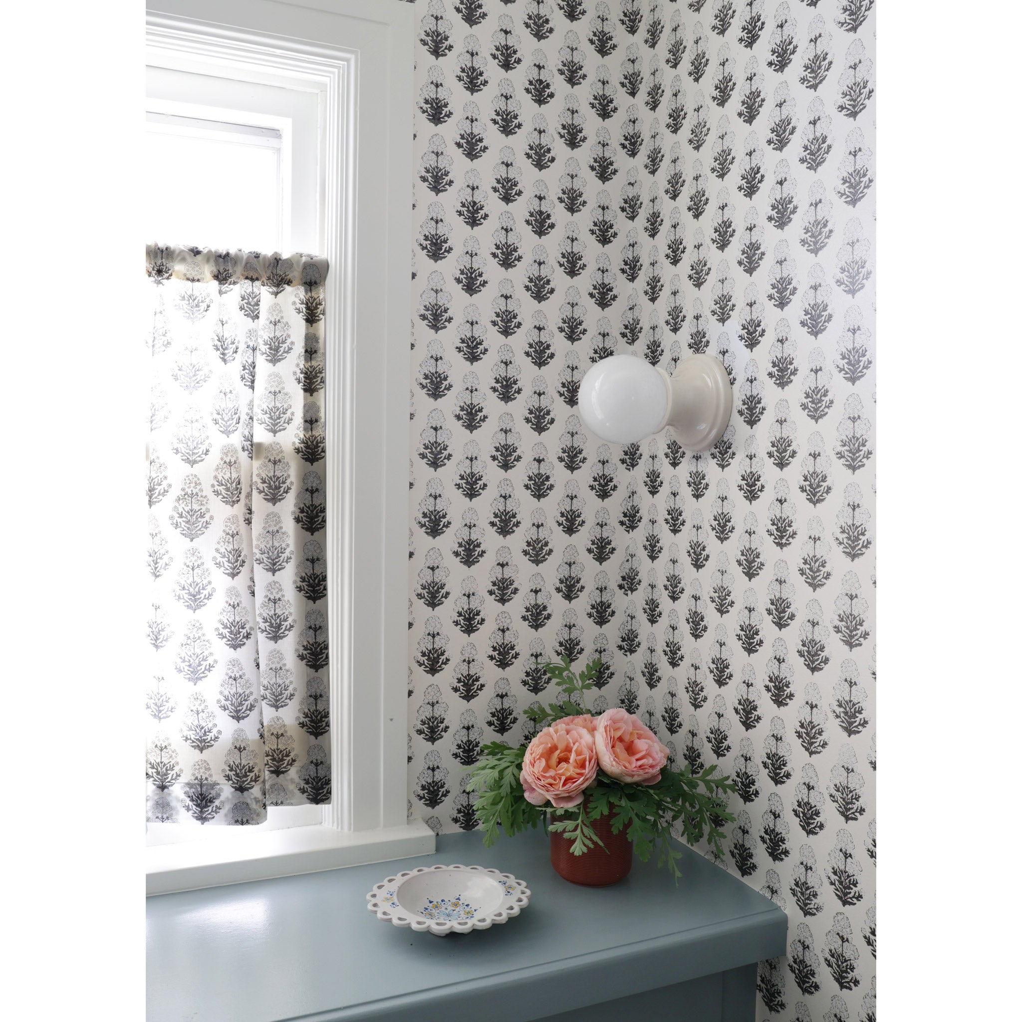 Emma Globe Sconce shown with Gloss White Glaze