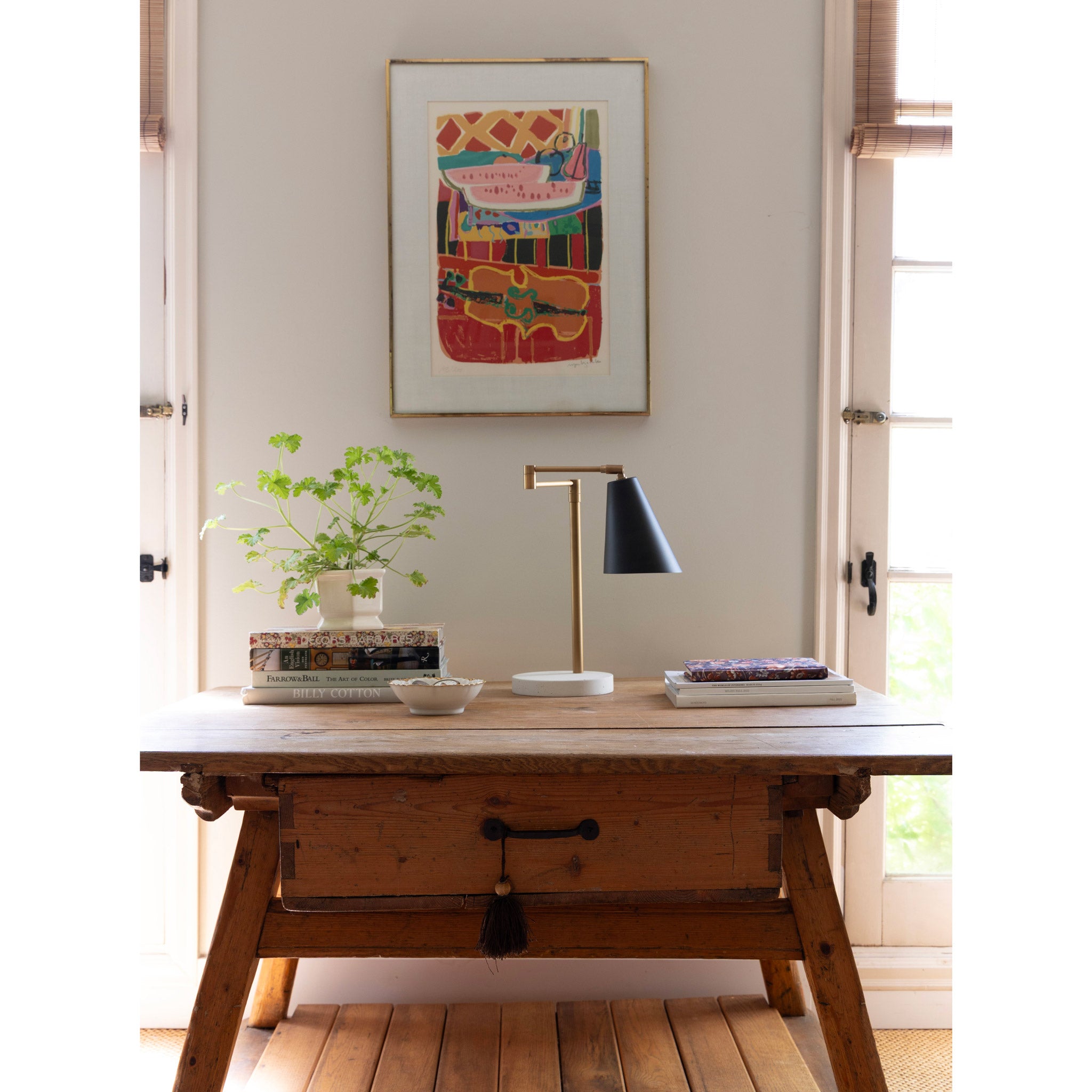 Tilt Cone Articulated Lamp shown in Matte Black. Interior design by Sarah J. Meyer Design