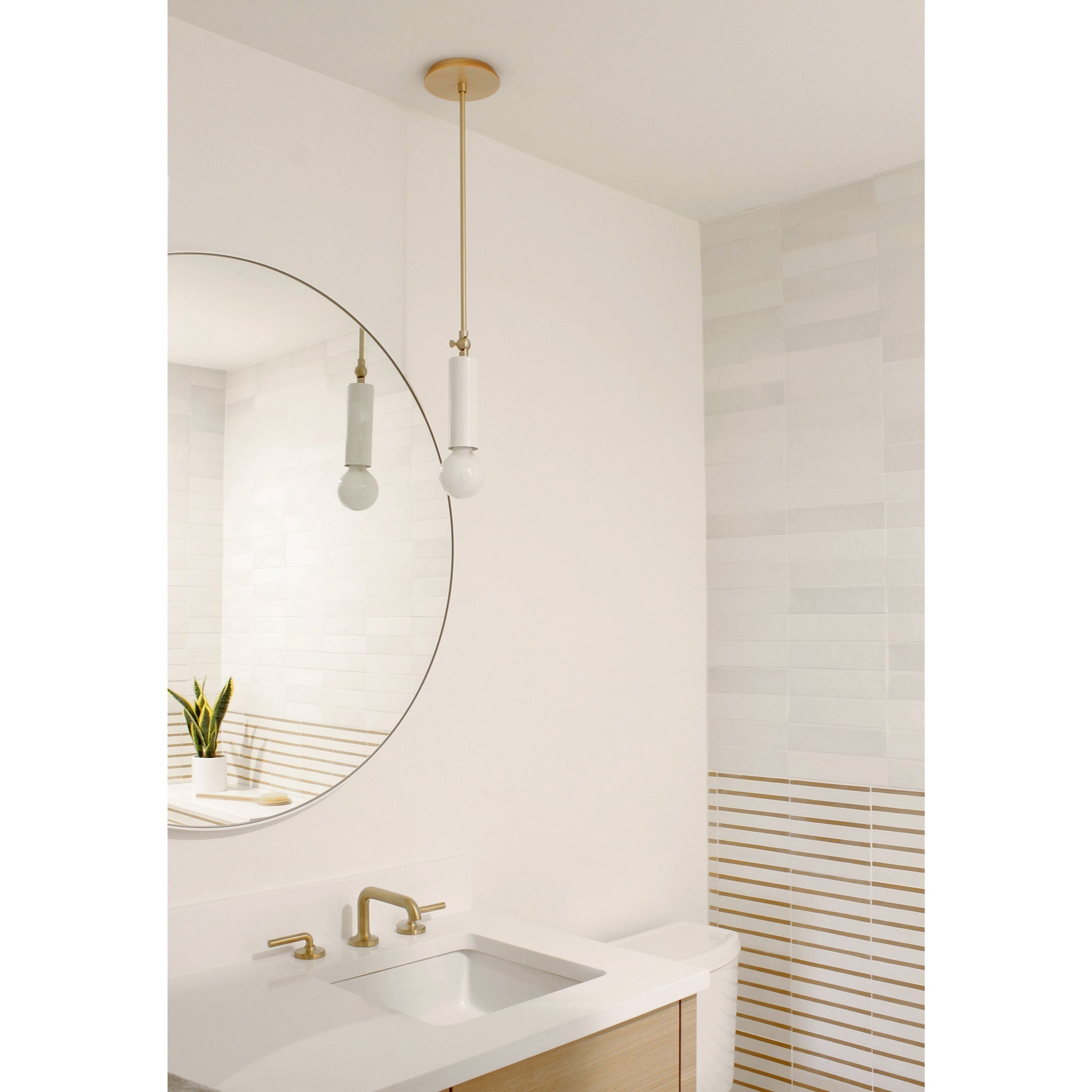 Fjord Spot Pendant for Vaulted Ceiling shown in White with Brass. Interior Design by Teal Davison