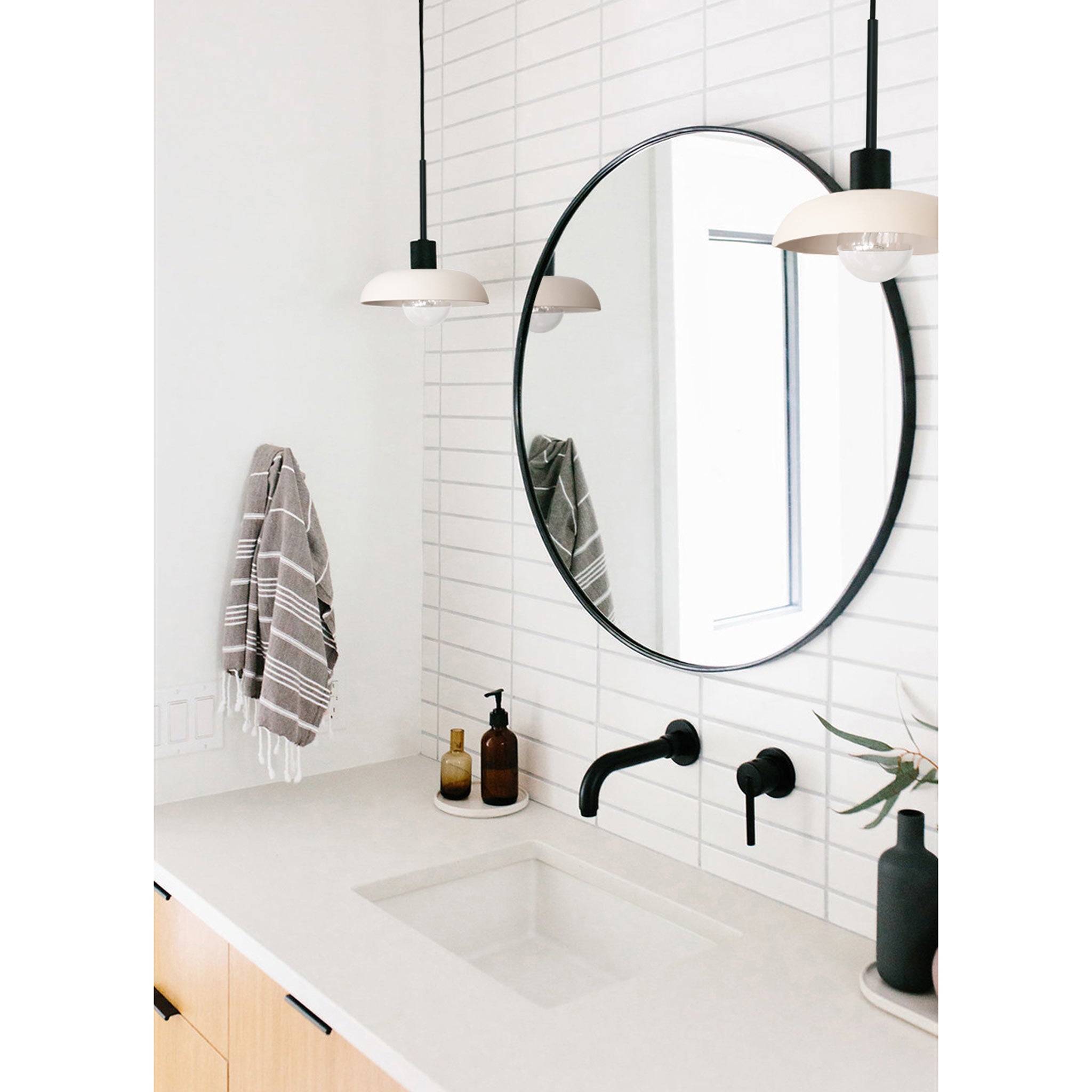 Terra Cord Pendant shown in Bone ceramic finish with Matte Black metal. Interior Design by Jen Pinkston, Photo by Katie Jameson