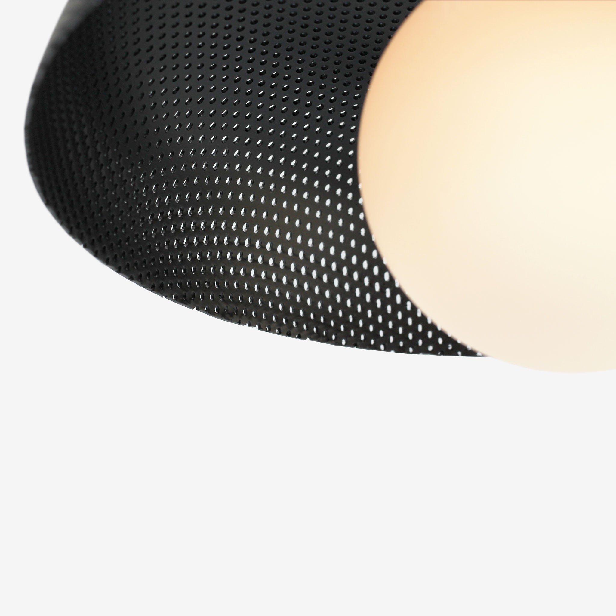 Sally Sconce shown with a Perforated shade in Matte Black