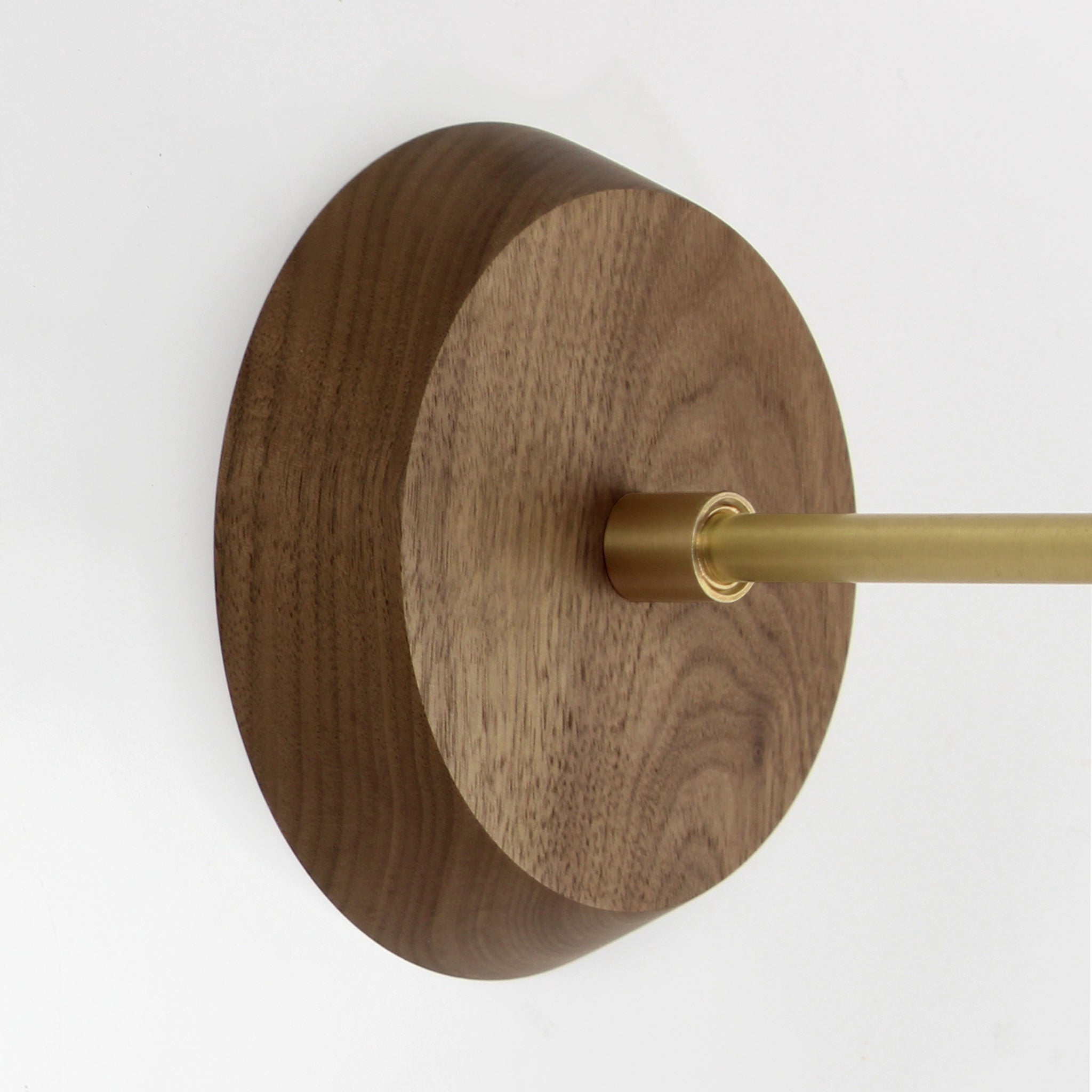 Wood canopy shown in Walnut with Brass arm