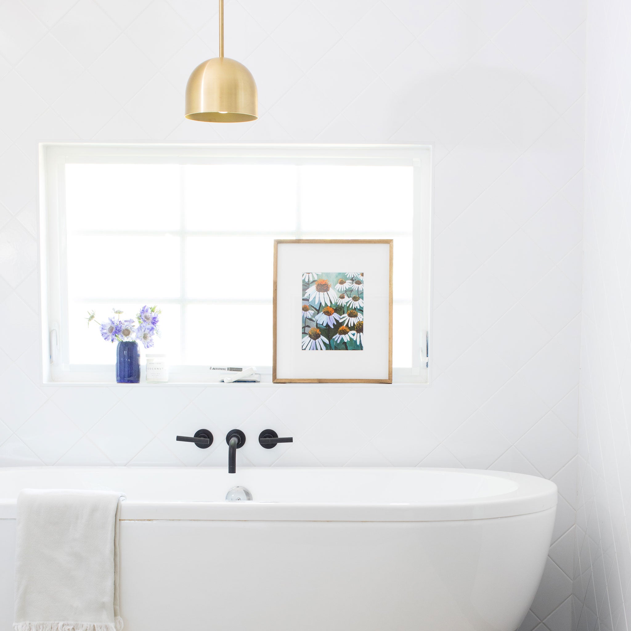 Amélie Cord 8" shown in Brass with Brass Rod Detail. Interior design by Jenny Komenda of Juniper Studio.