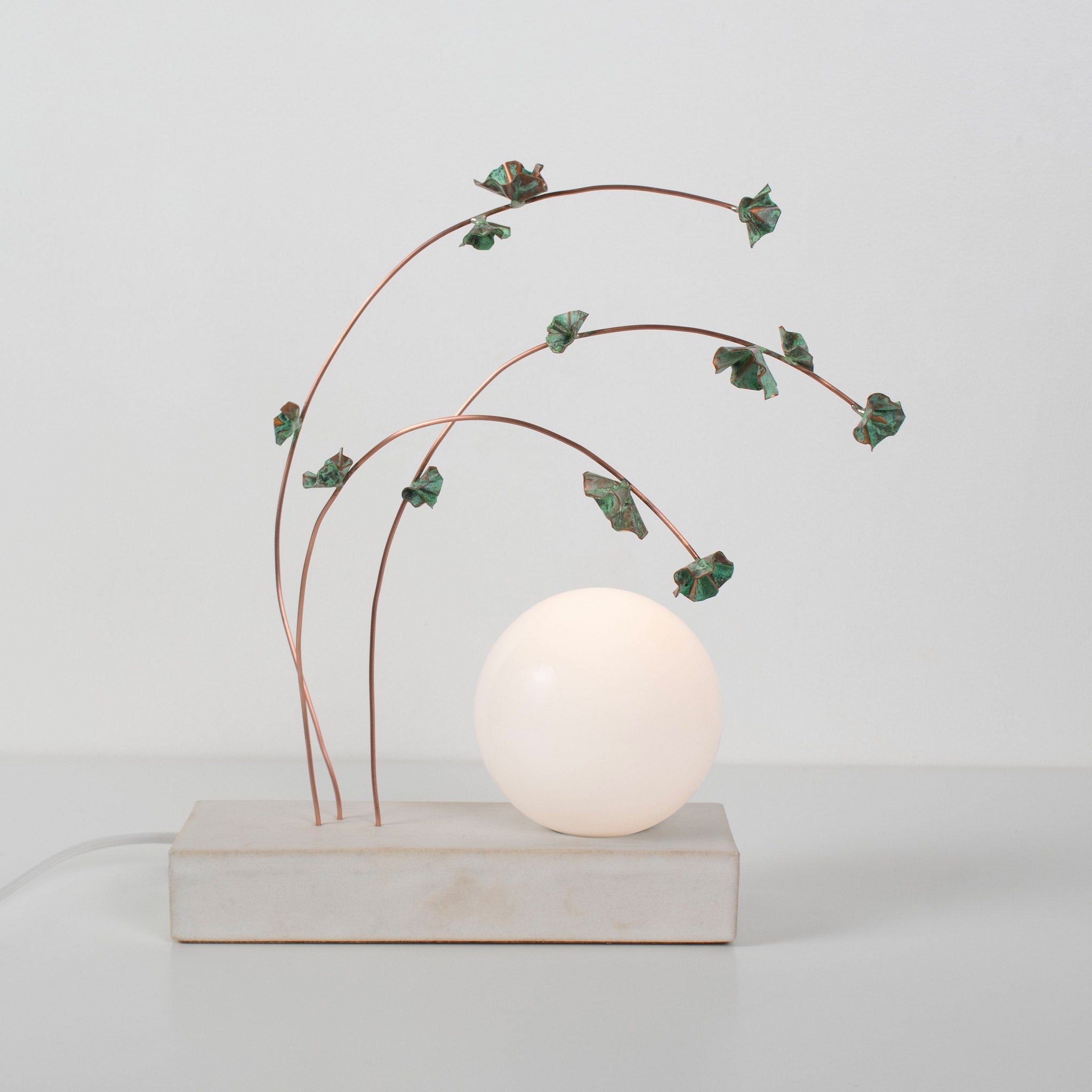 Ikebana Table Lamp shown in Verdigris flower finish