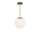 Alto Rod 10” Opal shown in Heirloom Brass with a Forest Green Star Ceramic Canopy