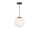 Alto Rod 10” Opal shown in Heirloom Brass with an Indigo Blue Sunflower Ceramic Canopy