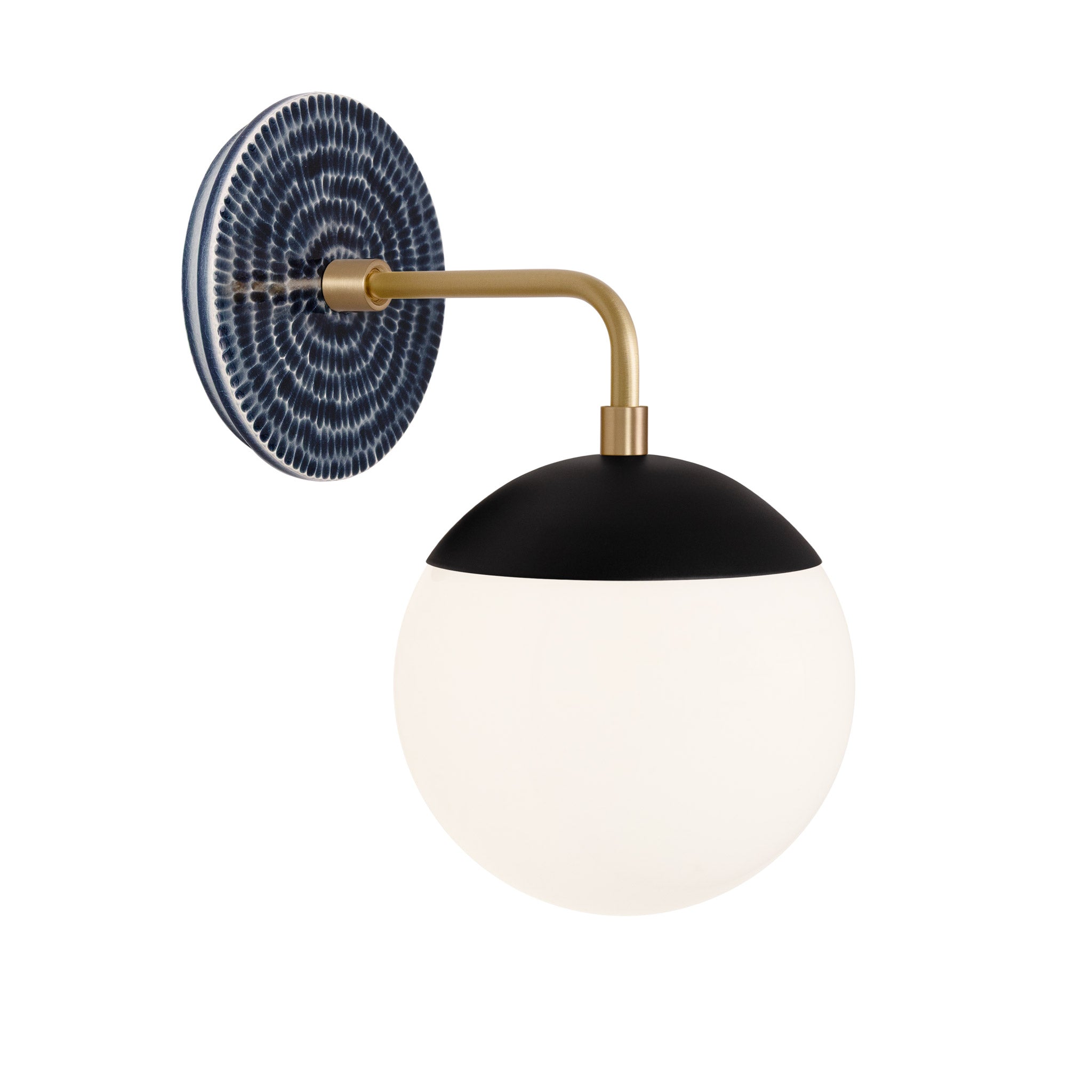 Alto Sconce 6” shown in Matte Black with Brass and an Indigo Blue Sunflower Ceramic Canopy