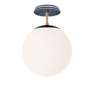 Alto Surface 10” shown in Matte Black with Brass and an Indigo Blue Star Ceramic Canopy