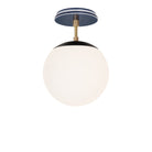 Alto Surface 8" shown in Matte Black with Brass and an Indigo Blue Star Ceramic Canopy
