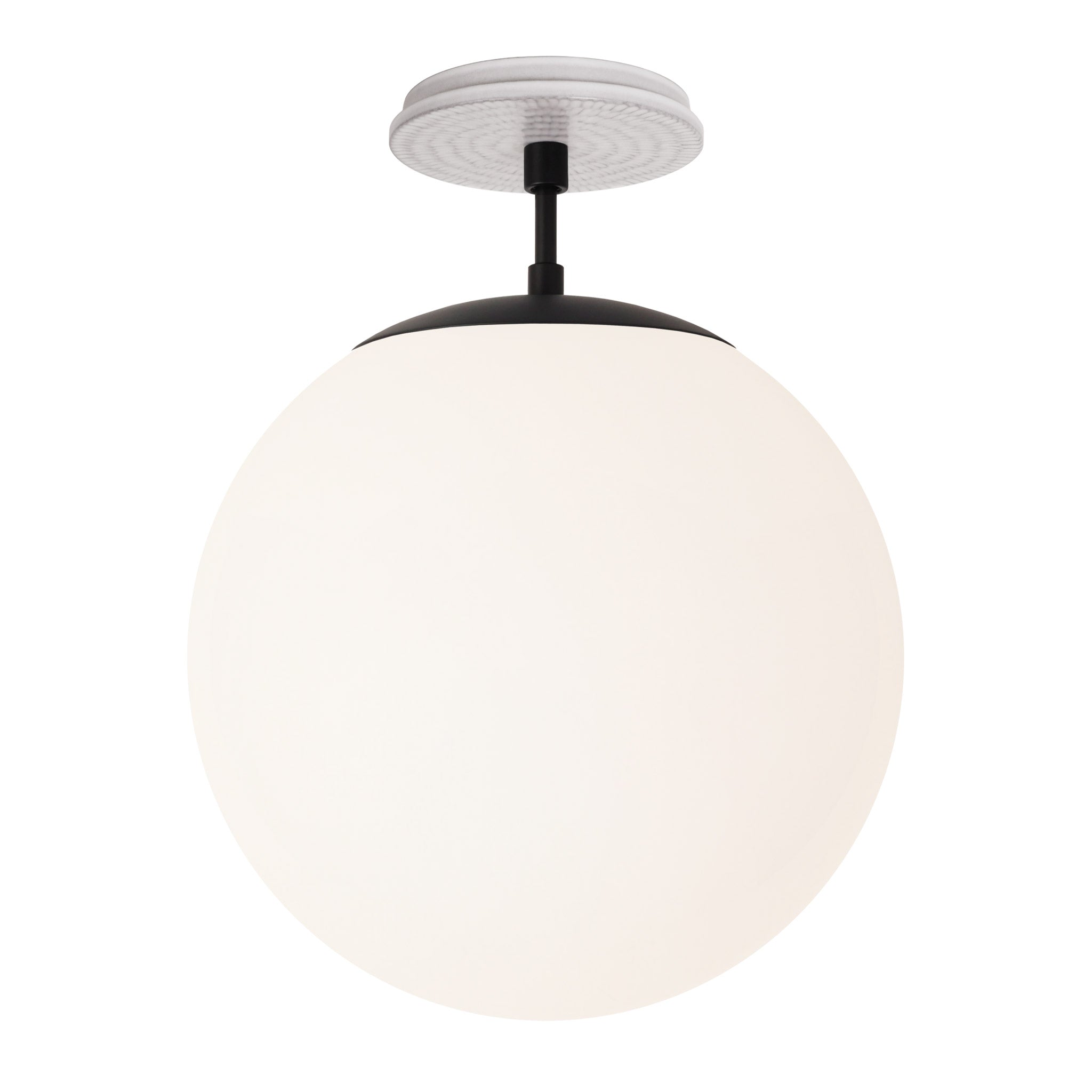 Alto Surface 12” shown in Matte Black with a Brownstone White Sunflower Ceramic Canopy