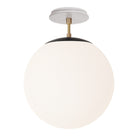 Alto Surface 12” shown in Matte Black with Brass and a Brownstone White Sunflower Ceramic Canopy