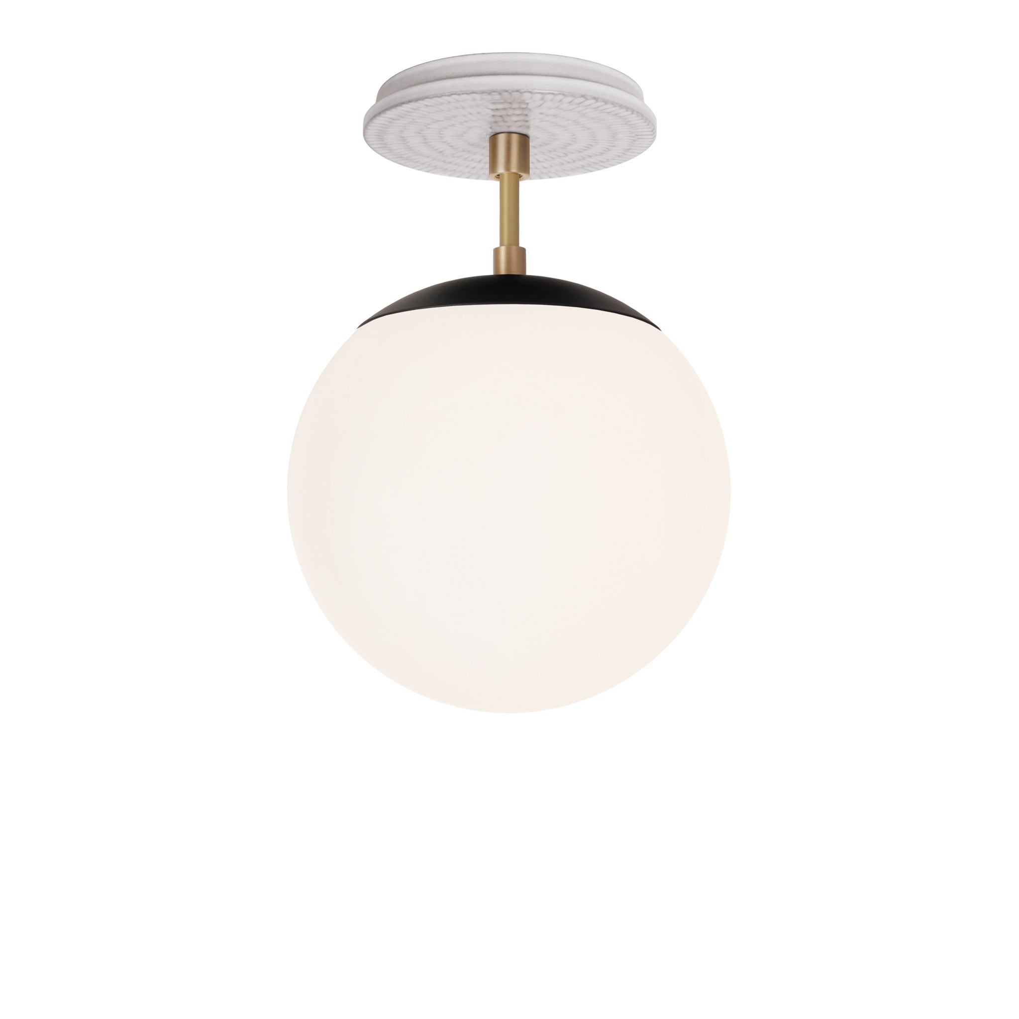Alto Surface 8" shown in Matte Black with Brass and a Brownstone White Sunflower Ceramic Canopy