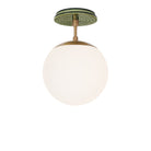 Alto Surface 8" shown in Heirloom Brass with a Forest Green Sunflower Ceramic Canopy