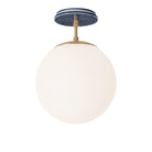Alto Surface 10” shown in Brass with an Indigo Blue Sunflower Ceramic Canopy