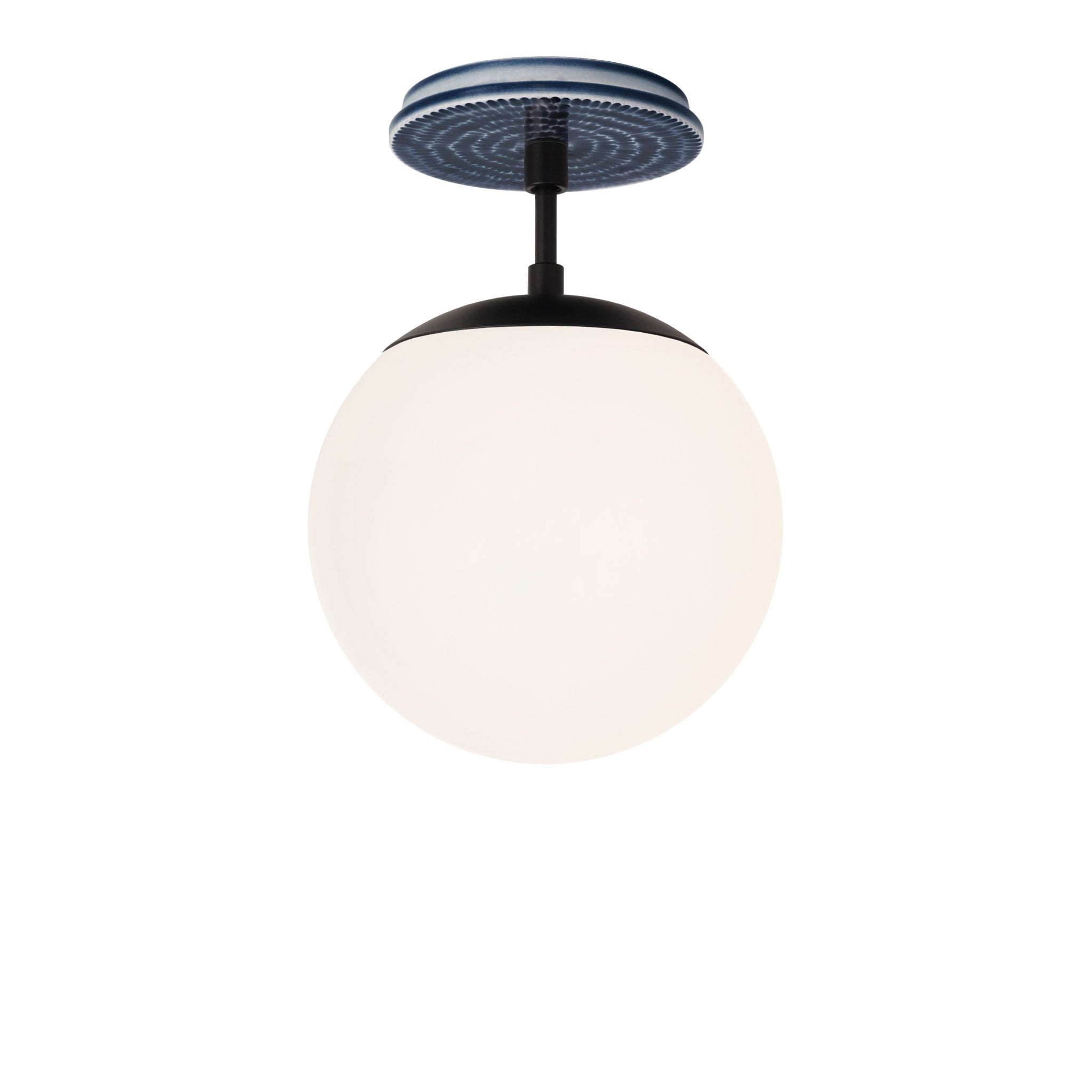 Alto Surface 8" shown in Matte Black with an Indigo Blue Sunflower Ceramic Canopy