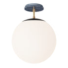Alto Surface 12” shown in Matte Black with Brass and an Indigo Blue Sunflower Ceramic Canopy