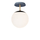 Alto Surface 8" shown in Matte Black with Brass and an Indigo Blue Sunflower Ceramic Canopy