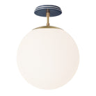 Alto Surface 12” shown in Brass with an Indigo Blue Swift Ceramic Canopy