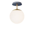 Alto Surface 8" shown in Brass with an Indigo Blue Swift Ceramic Canopy