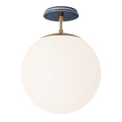 Alto Surface 12” shown in Heirloom Brass with an Indigo Blue Swift Ceramic Canopy