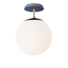 Alto Surface 10” shown in Matte Black with Brass and an Indigo Blue Swift Ceramic Canopy