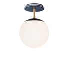 Alto Surface 8" shown in Matte Black with Brass and an Indigo Blue Swift Ceramic Canopy