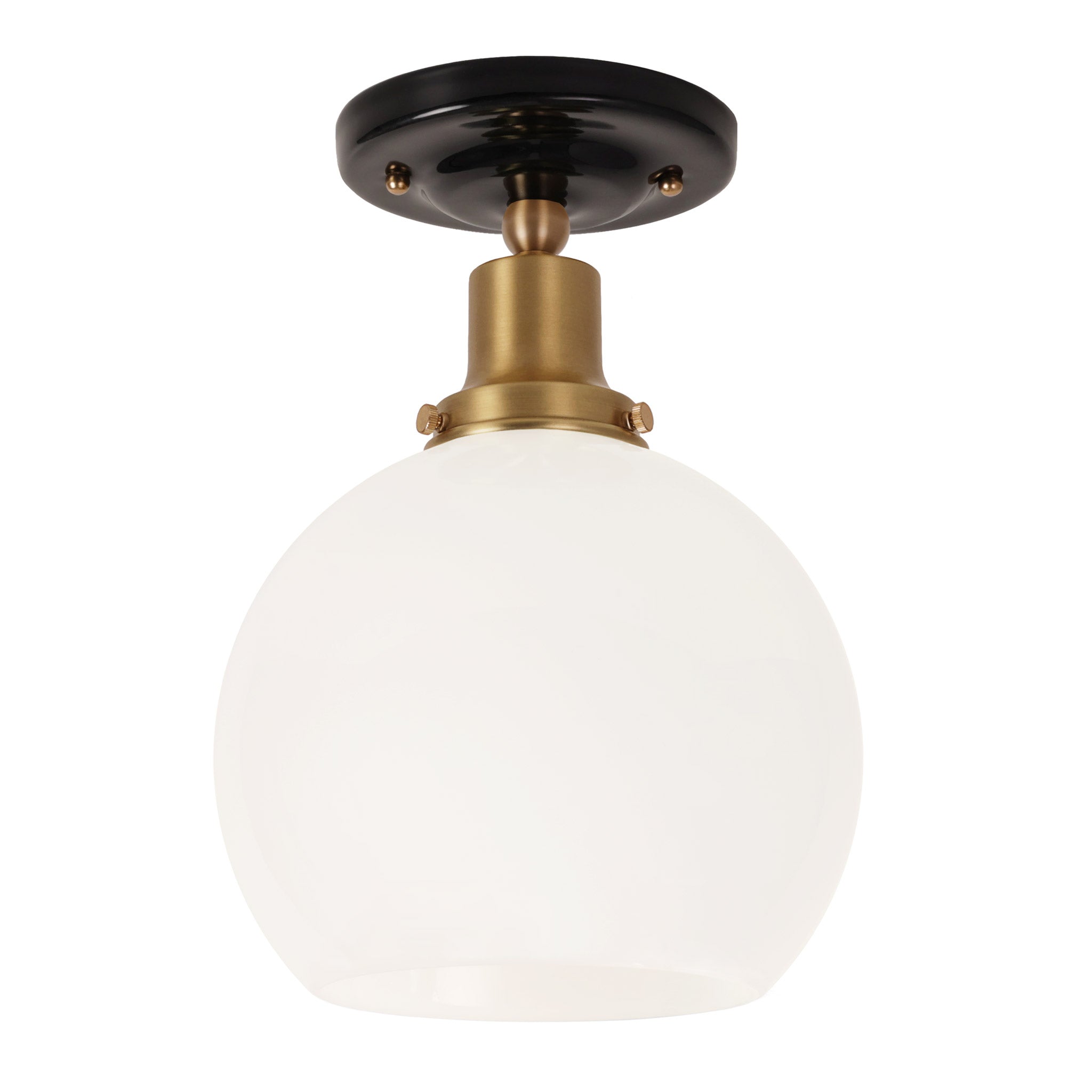 Beatrix Surface shown in Heirloom Brass with a Gloss Black Ceramic Canopy