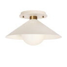 Elvia Surface shown in Heirloom Brass with a Bone Ceramic canopy