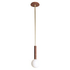 Parker Pendant shown in Walnut with Brass
