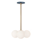 Selene Compass shown in Heirloom Brass with an Ocean Blue Canopy