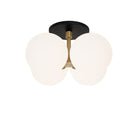 Selene Compass Surface shown in Heirloom Brass with a Matte Black Canopy