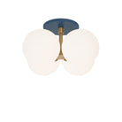 Selene Compass Surface shown in Heirloom Brass with an Ocean Blue Canopy