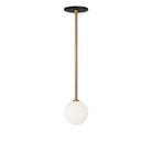 Selene Pendant shown in Heirloom Brass with a Matte Black Canopy