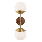 Theo shown in Heirloom Brass and a Walnut Wood Canopy