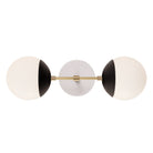 Theo shown in Matte Black with Brass and a Brownstone White Star Ceramic Canopy