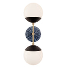 Theo shown in Matte Black with Brass and an Indigo Blue Sunflower Ceramic Canopy