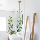 Timberline Rod Pendant shown in Brass. Interior design by Sarah Sherman Samuel for Smitten Studio