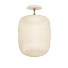 Umi Surface shown in Heirloom Brass with a Bone Ceramic Canopy