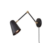 Wildwood Double Articulated shown in Matte Black with Brass Accents, a Black Cord and Backplate Dimmer Switch