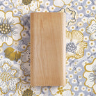 Allée ADA Sconce shown in Birch on Eldblomman wallpaper by Josef Frank