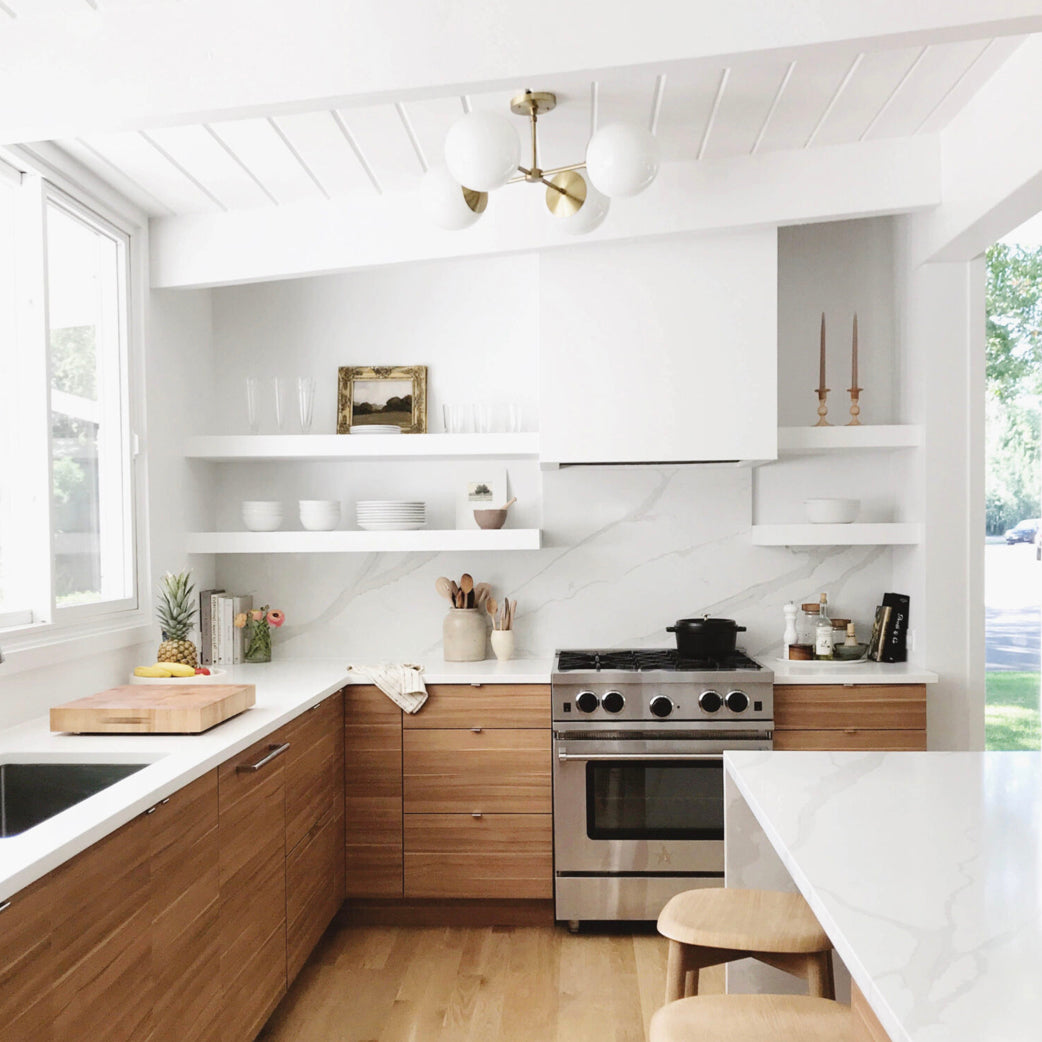Alto Compass 8" Opal for Vaulted Ceiling shown in Brass. Interior Design by Liz Bachman of Grey & Scout