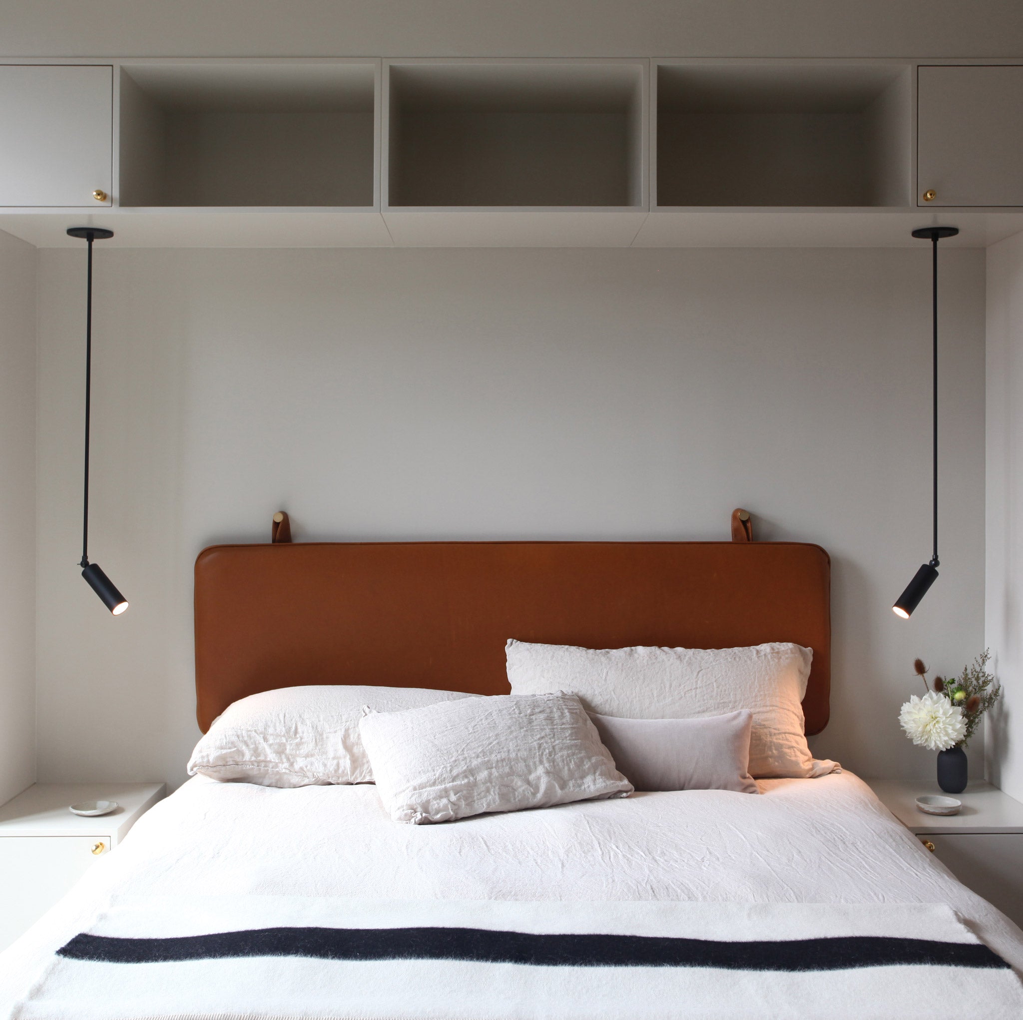 Fjord Spot Pendant shown in Matte Black with Recessed + LED Bulb. Interior design by Worktable NYC Deb McKeand. Photo by Jeff Rudy