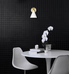 Petra Sconce shown in White and Brass