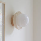 Terra Lexi shown in Bone ceramic and Maple wood canopy